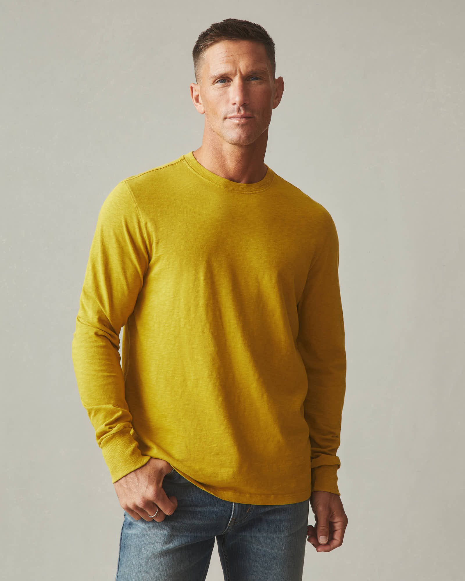 golden yellow long sleeve shirt